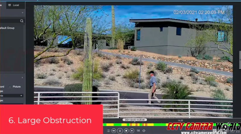 Auto Tracking losing person walking behind cactus