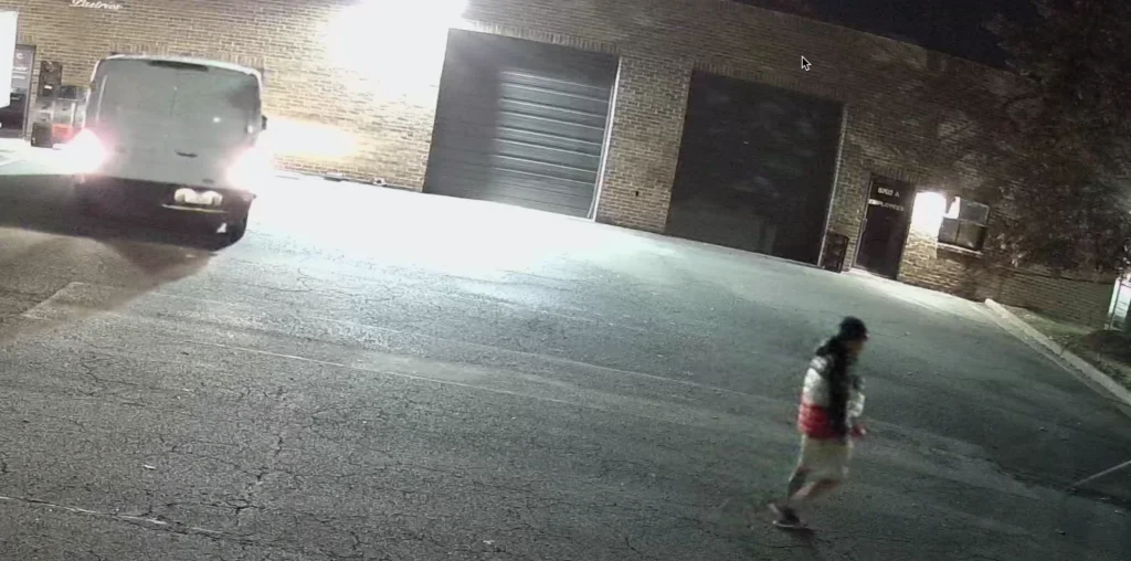 Example of a person and vehicle too far from a general 4K security camera to capture license plate details at night