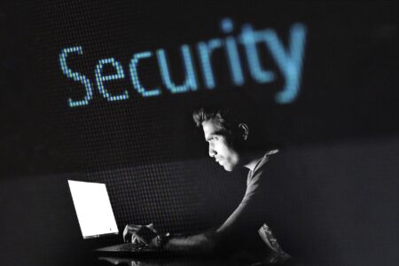 A man hacking a computer