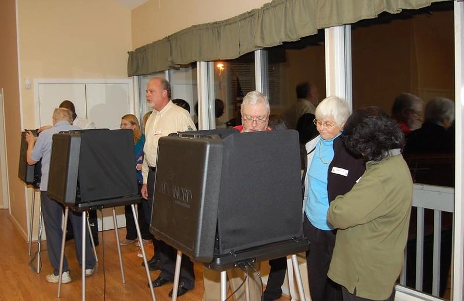 Voters at Electronic Voting Booths