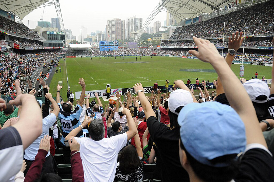Crowd cheering at soccer match