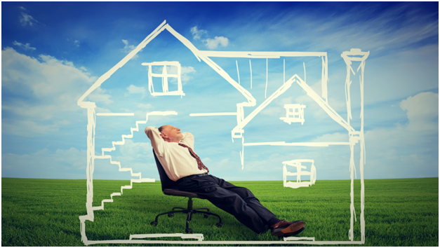 man relaxing in drawn house and open field